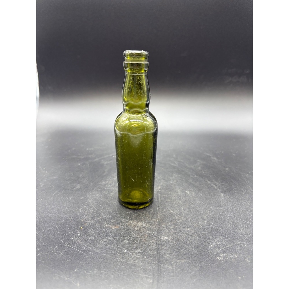 Vintage Olive Green Lady Leg Sample Sized Whiskey Bottle‎